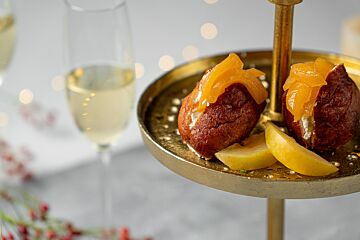 Oliebollen met pruimen